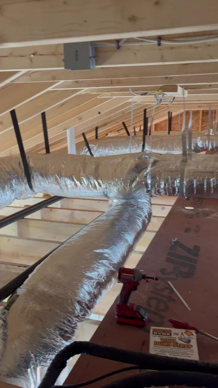 Running insulated duct the length of the attic