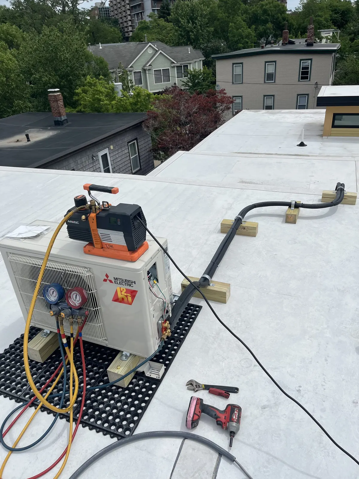 Rooftop condenser going through commissioning by TJM Climate Control, Southern NH & northern MA